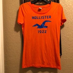 NWOT Vintage Orange Hollister 1922 with Bird logo in Navy Blue Top. Super Soft.